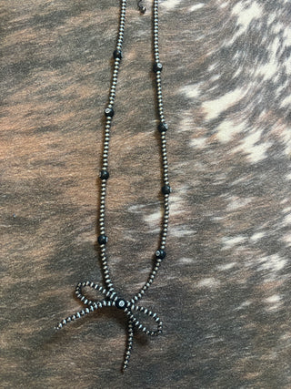 8-ball bow necklace